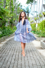 Load image into Gallery viewer, Stylish Azora snake print kaftan for women, with metallic blue beadwork, ideal for Dubai resort vacations.
