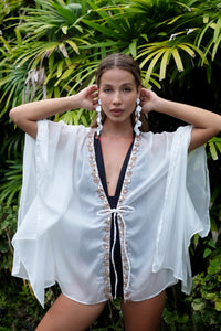 Sophisticated beachwear for women – white chiffon beach kaftan with crystal detail, made in Bali for women looking for best cover ups for the beach in Dubai
