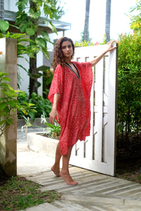 Women's resort wear kaftan in red and white print – sustainable fashion for Dubai beaches
