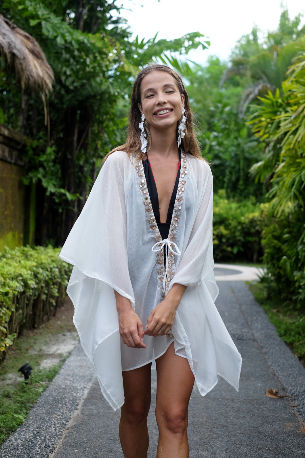 Lightweight beach cover-up in white chiffon with hand-sewn beading, for women looking for best beach kaftans in Dubai
