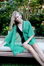 Load image into Gallery viewer, Glamorous beach kaftan in a gorgeous green crepe chiffon with hand sewn neckline beads, for women wanting best beach kaftans in Dubai