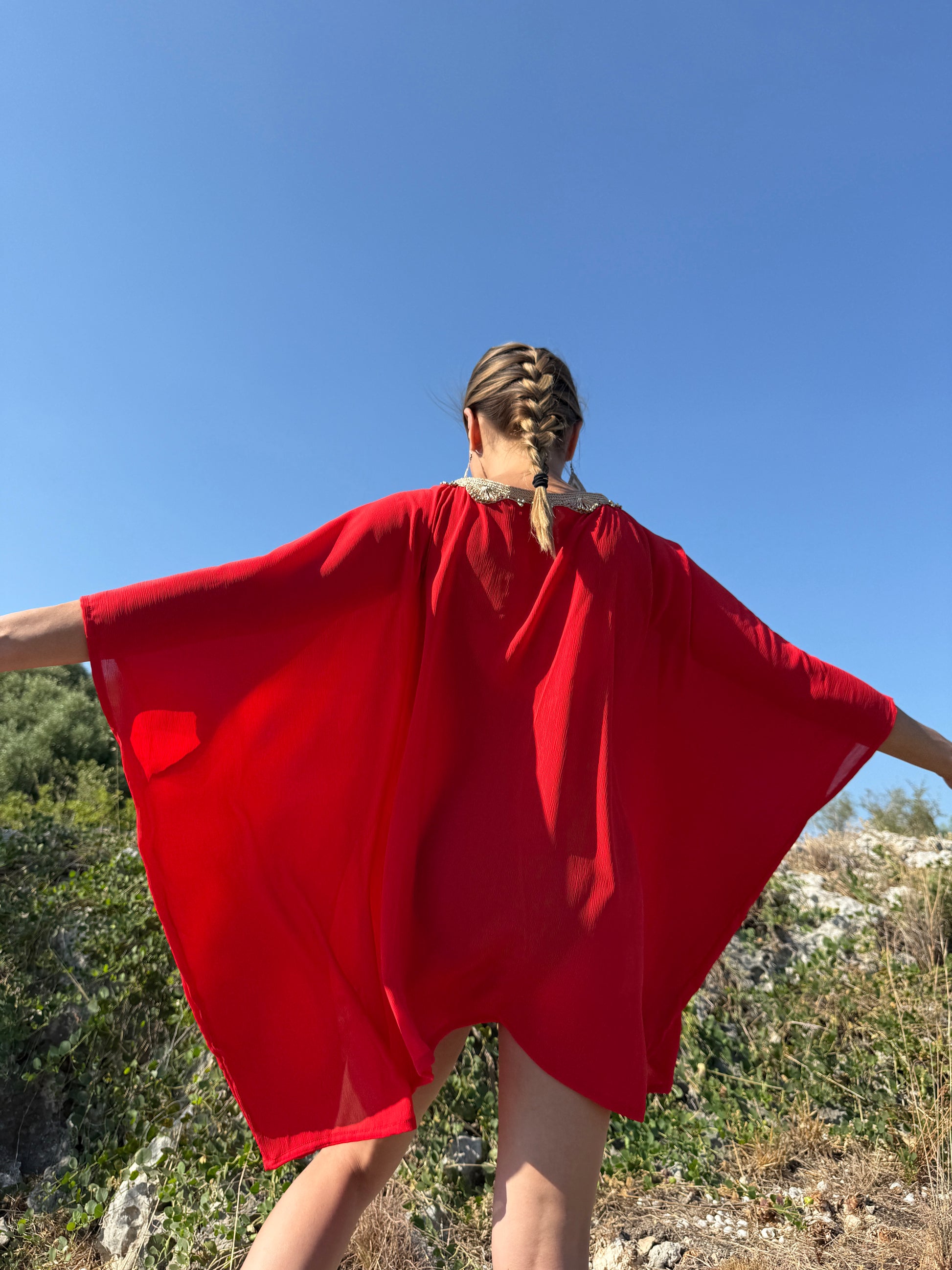 Elegant & luxurious red kaftan cover up, sustainable resort wear from Bali with gold neckline trim for women in Dubai