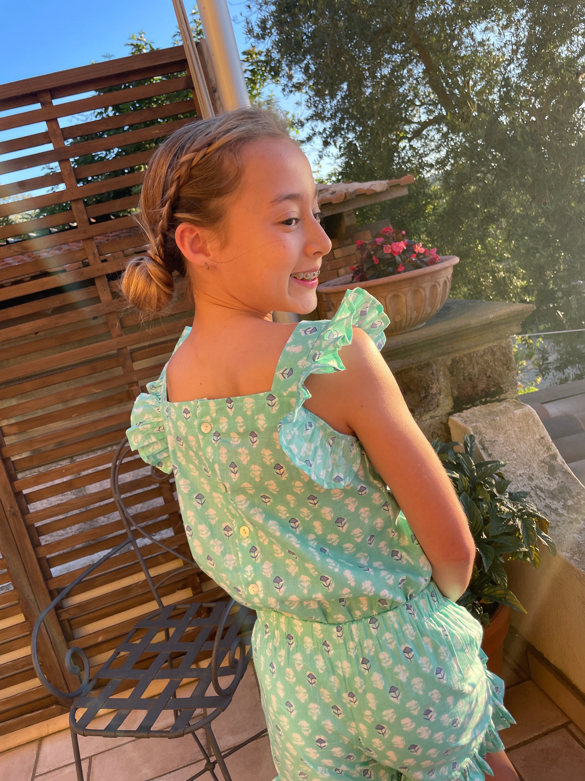 pretty summerwear for girls in mint green floral as a ruffled two-piece coord set

