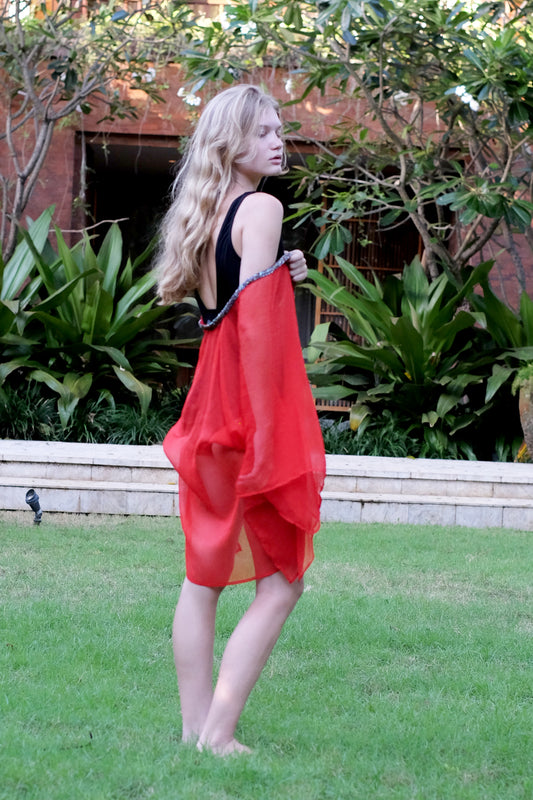 Luxury resort wear kaftan in vibrant red chiffon with hand-sewn neckline beads, for women in dubai looking for sustainable beach kaftans
