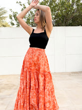 Load image into Gallery viewer, Gaia slow fashion orange floral block print maxi skirt handmade with plant-dyes for resort wear in Dubai
