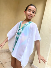 Load image into Gallery viewer, Ethically made girls&#39; beach cover-up in white lurex chiffon with hand-stamped green floral batik border.
