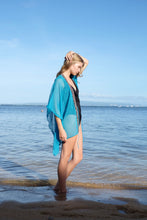 Load image into Gallery viewer, Handmade turquoise beach kaftan for women in Dubai with artisan bead details, sustainably made in Bali
