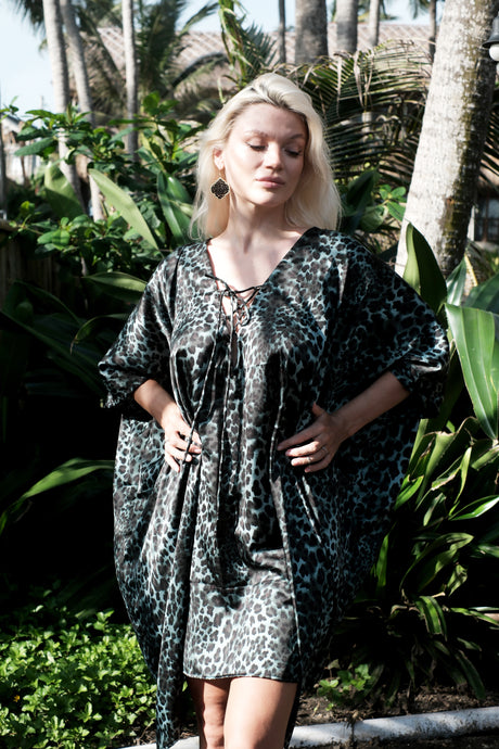 Handmade green leopard satin beach kaftan dress for women, worn loose for elegant beachwear in Dubai
