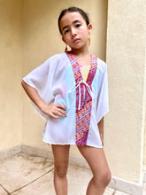Load image into Gallery viewer, Artisanal Onism Kids Beach Kaftan in white lurex chiffon with colorful batik trim – lightweight, breathable, and perfect for beach days in Dubai
