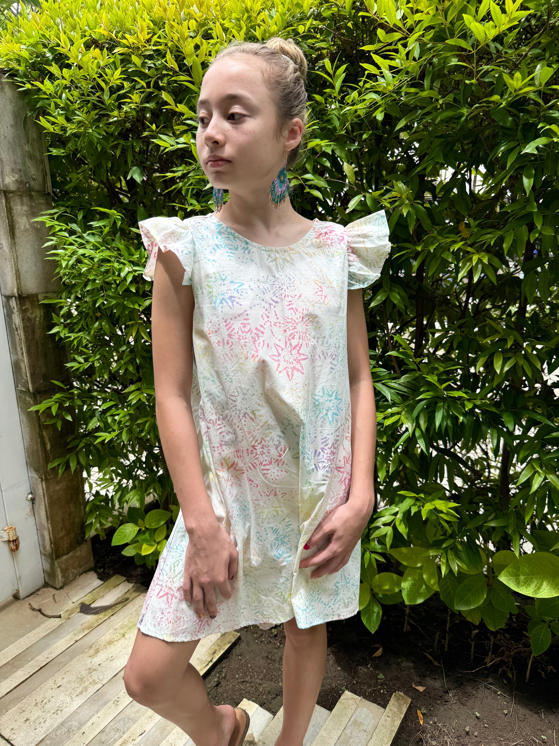 Handmade Tallulah girls’ batik summer dress in white, crafted from authentic Indonesian batik cotton for breathable comfort