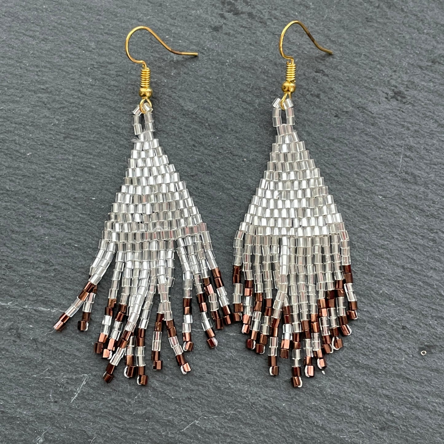 Indah handmade silver and brown beaded earrings, artisan-crafted in Bali for women in Dubai

