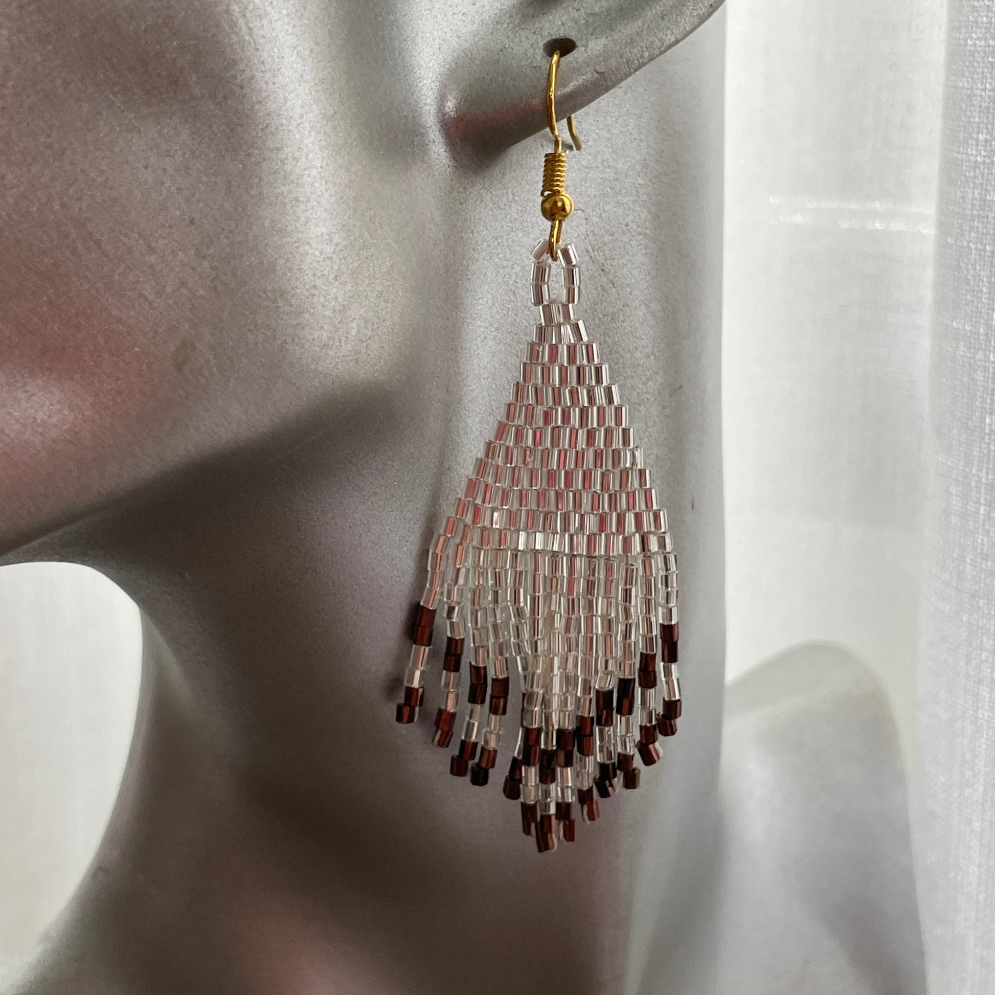 Bali artisan silver and brown beaded earrings, perfect statement jewelry for UAE fashion lovers

