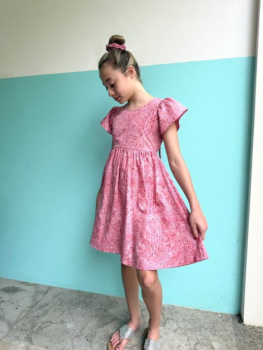 Sustainable Ivy girls' batik sundress in pink floral print, handmade kids' dress from Bali for sale in Dubai
