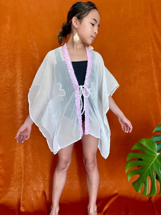 Sustainable girls' beach kaftan in white chiffon with purple sequin neckline, perfect for Dubai beach holidays