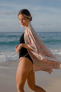 Women’s beach kaftan with shimmering bead trim, shop the Sakura pastel floral satin women's beach kaftan swimsuit cover up in Dubai