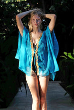 Load image into Gallery viewer, Nafeesa turquoise kaftan with hand-sewn gold saree trim, with a luxurious look and feel for women looking for the best beach kaftans and cover ups in Dubai
