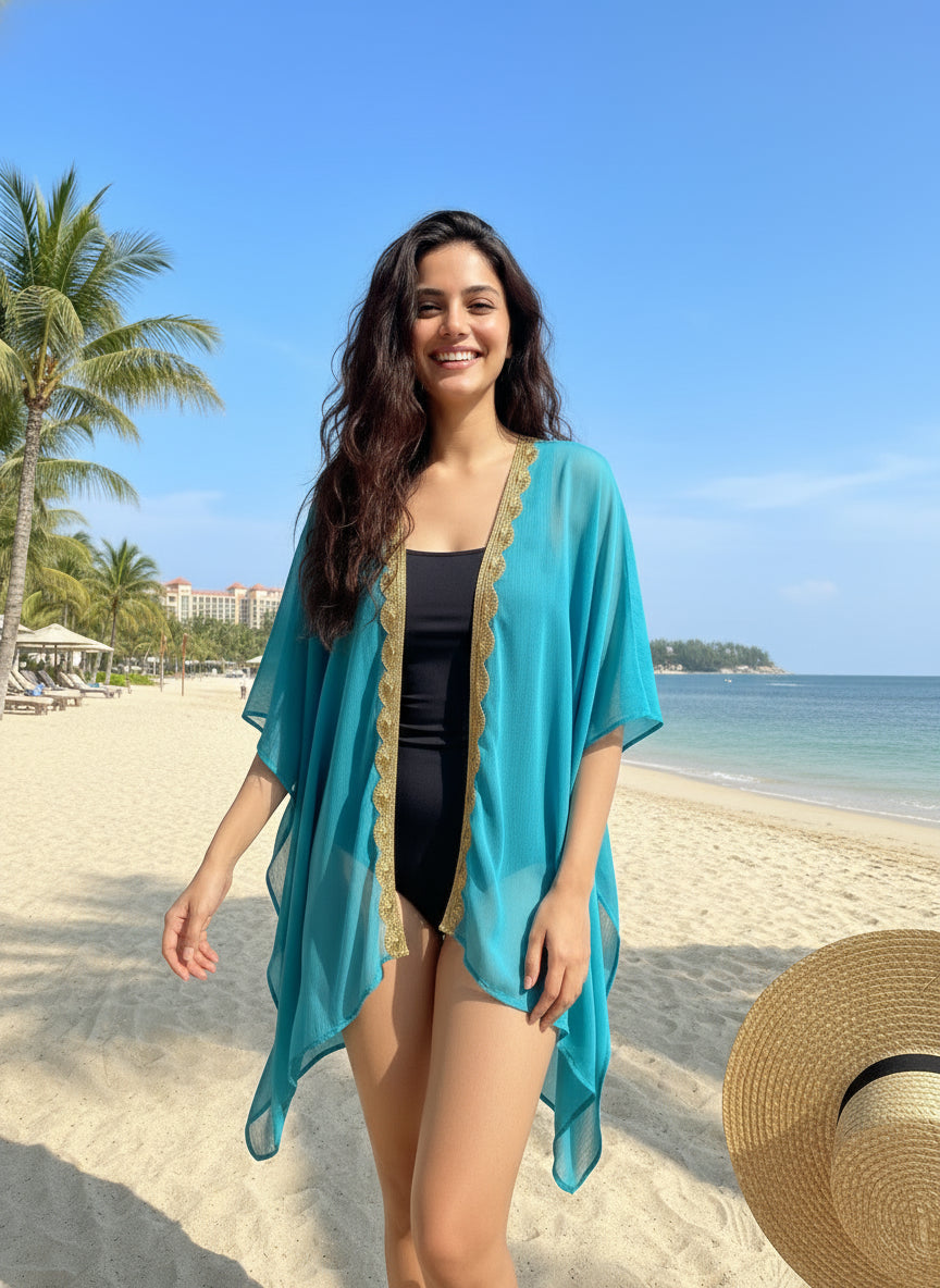 Elegant Bali-made turquoise kaftan with gold saree detailing, slow fashion resort wear for women in Dubai