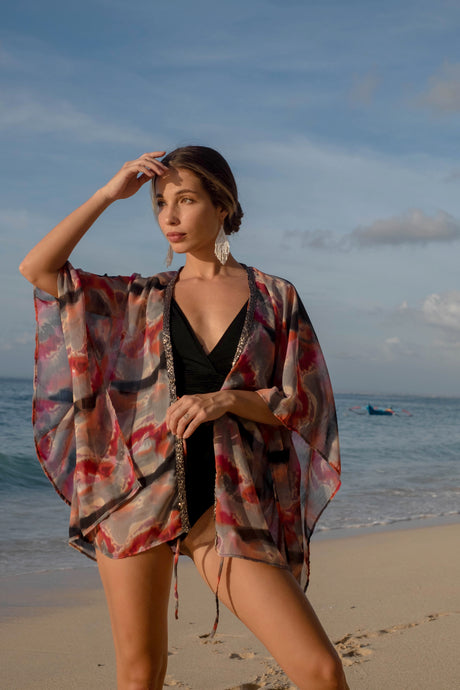 Handmade ombre beach kaftan for women in red, orange, and grey chiffon with silver bead trim – Dubai resort wear
