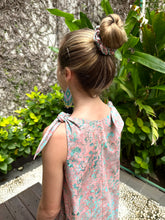 Load image into Gallery viewer, Back view of Penelope blush pink floral girls’ beach dress, sustainable batik cotton sundress for resort and casual wear, for sale in Dubai
