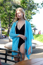 Load image into Gallery viewer, Safra turquoise beach kaftan with hand-beaded neckline trim for beach outings in Dubai
