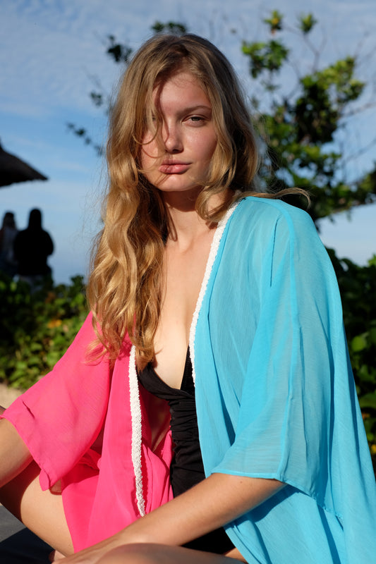 Safra turquoise and hot pink kaftan with hand-beaded neckline, sustainable kaftans from Bali designed for women looking for best beach kaftans in Dubai

