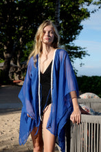 Load image into Gallery viewer, Elegant lapis blue crepe chiffon women’s beach cover-up with hand-sewn bead neckline detail for Dubai holidays and beach outings
