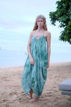 Load image into Gallery viewer, Luxurious green chiffon Seraphina dress styled as a halter, ideal for beach vacations and resort elegance in Dubai.
