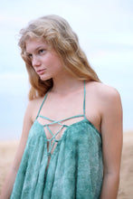 Load image into Gallery viewer, Seraphina halter kaftan dress in textured green chiffon, a flowy and elegant choice for resort holidays or other tropical escapes. Sustainable resort wear for women in Dubai