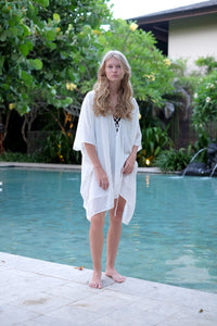 Lightweight and breezy white Seraphina kaftan dress with metallic details, perfect for Dubai beach days, sustainable resort wear for women made in Bali
