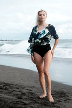 Load image into Gallery viewer, Shira kaftan top with navy abstract print and white beaded neckline, sustainable resort wear in Dubai