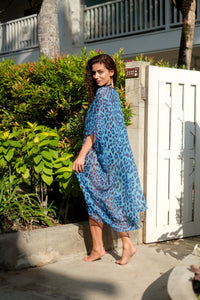 Women's silk chiffon leopard print kaftan, luxury beach dress perfect for Dubai beach getaways, poolside lounging, and resorts.
