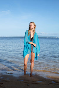 Luxury turquoise crepe chiffon kaftan cover-up for beach and resort wear for women looking for unique beach kaftans in Dubai
