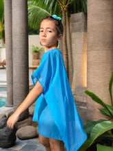Load image into Gallery viewer, Dubai beachwear for girls – Anisa girls beach kaftan cover up in blue chiffon with multicolored neckline accents.
