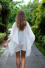 Load image into Gallery viewer, Elegant swimsuit cover-up with rose gold crystal beaded trim, sustainably made in Bali for women looking for what to wear at beaches in Dubai
