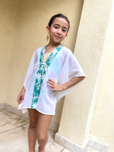 Load image into Gallery viewer, Lightweight and breezy kids kaftan dress with shimmering chiffon and vibrant green batik trim – Dubai resort wear.
