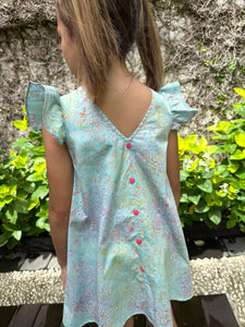 Girls' summer batik sundress – lightweight, breathable cotton batik, handmade in Bali, back view of pink buttons and pretty batik fabric, for girls in Dubai
