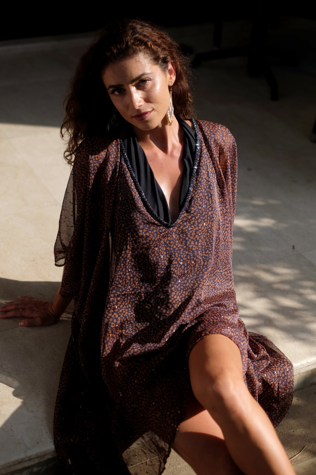 tamala long leopard print beach kaftan with blue beaded neckline, perfect for Dubai resort wear