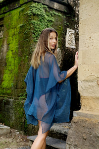 Sustainable beachwear brand showcasing the Ciana teal beach kaftan made sustainably in Bali for glamorous beach loving women in Dubai