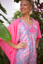 Load image into Gallery viewer, Vibrant neon pink beach cover-up kaftan with traditional hand-stamped batik trim, sustainable resort wear from Bali for women looking for best beach kaftans in Dubai