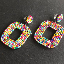 Load image into Gallery viewer, Yelia handmade beaded bold coloured statement dangle earrings in rainbow