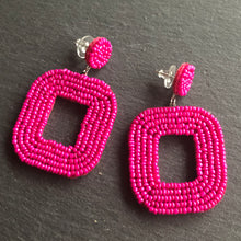 Load image into Gallery viewer, Yelia handmade beaded bold coloured statement dangle earrings in fuchsia