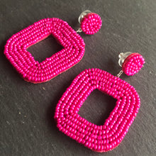Load image into Gallery viewer, Yelia handmade beaded bold coloured statement dangle earrings in fuchsia