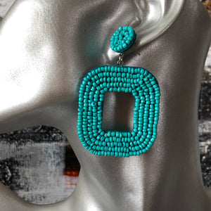 Yelia handmade beaded bold coloured statement dangle earrings in sea green