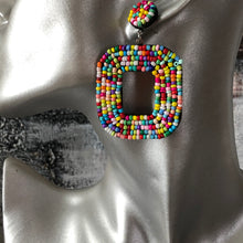 Load image into Gallery viewer, Yelia handmade beaded bold coloured statement dangle earrings in rainbow