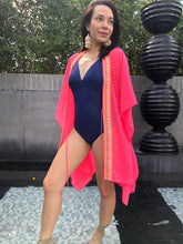 Load image into Gallery viewer, Ixchel bright bold colourful neon pink neon orange tassel trimmed womens beachwear beach kaftan