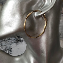 Load image into Gallery viewer, Dea matte twisted gold hoop earrings