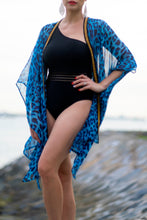 Load image into Gallery viewer, Handcrafted silk chiffon beach kaftan with chic gold neckline and striking blue leopard print, perfect for women with bold fashion style in Dubai