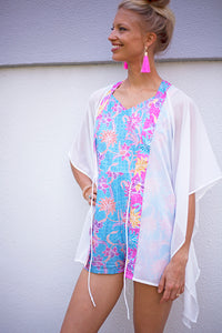 Lestari beach kaftan in white crepe chiffon with Indonesian artisan-made batik trim, sustainably made in Bali for women in Dubai