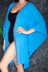 Kaia womens beachwear beach kaftan cover up in azure blue with hand sewn rainbow beaded trim