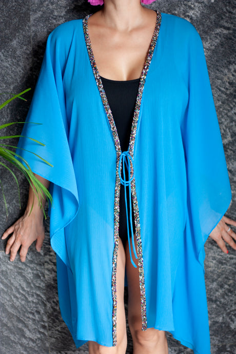 Kaia womens beachwear beach kaftan cover up in azure blue with hand sewn rainbow beaded trim